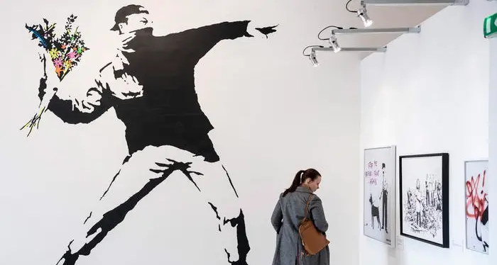 Banksy perde causa per il marchio del Lanciatore di fiori