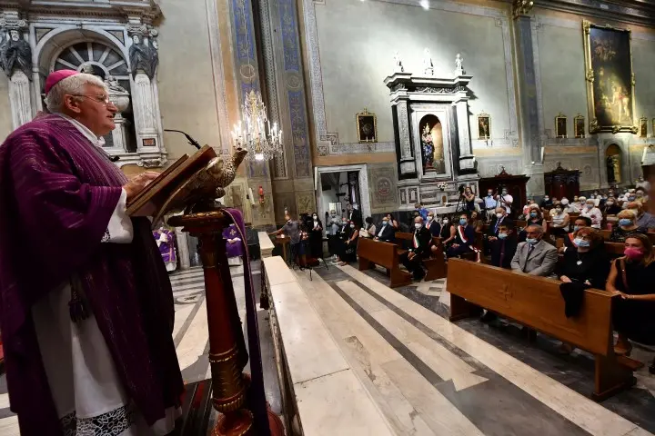 Genoa’s Archbishop Marco Tasca celebrates a mass as part of events marking the second anniversary of the Morandi Bridge collapse in Genoa, Italy, 14 August 2020. On 14 August 2018, the Morandi highway Bridge gave way during heavy rain. Dozens of cars and several trucks fell below. A total of 43 people were killed in the disaster and hundreds more were injured. ANSA/ LUCA ZENNARO
