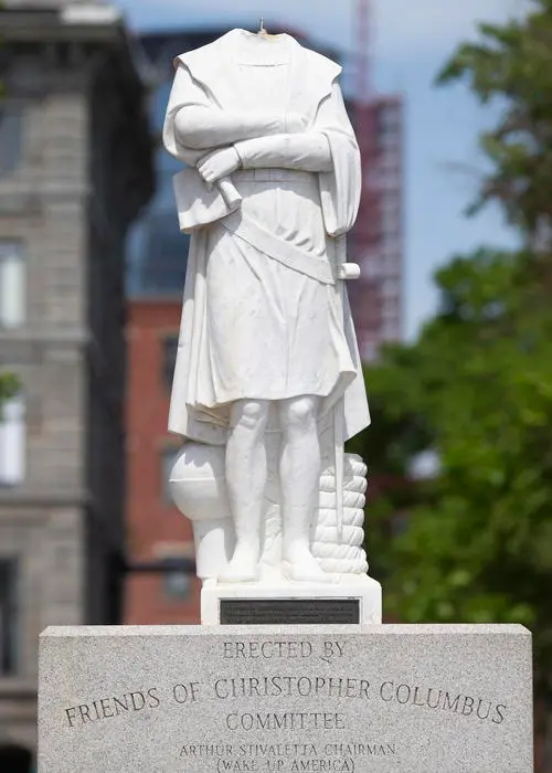 epa08477802 The decapitated statue of Christopher Columbus in Columbus Park in the North End neighborhood of Boston, Massachusetts, USA 10 June 2020. Overnight vandals removed the head of the statue, and a second statue of Christopher Columbus was thrown into a lake in Richmond Virginia. EPA/CJ GUNTHER