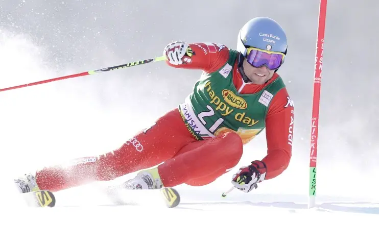 epa04661732 Davide Simoncelli of Italy clears a gate during the first run in the Men's Giant Slalom race at the FIS Alpine World Ski Championships in Kranjska Gora, Slovenia, 14 March 2015. EPA/ANTONIO BAT