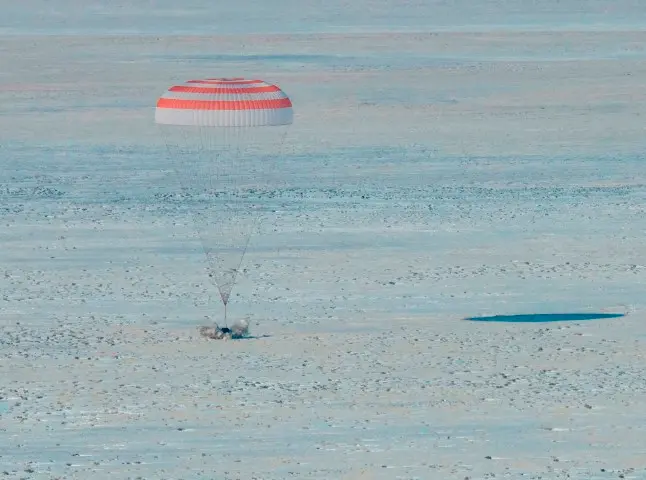 epa08197176 A handout photo made available by NASA the Soyuz MS-13 spacecraft landing with Expedition 61 crew members Christina Koch of NASA, Alexander Skvortsov of the Russian space agency Roscosmos, and Luca Parmitano of ESA (European Space Agency), in a remote area near the town of Dzhezkazgan, Kazakhstan, 06 February 2020. Koch returned to Earth after logging 328 days in space -- the longest spaceflight in history by a woman -- as a member of Expeditions 59-60-61 on the International Space Station (ISS). Skvortsov and Parmitano returned after 201 days in space where they served as Expedition 60-61 crew members onboard the station. EPA/NASA/BILL INGALLS HANDOUT -- MANDATORY CREDIT: (NASA/Bill Ingalls) -- HANDOUT EDITORIAL USE ONLY/NO SALES