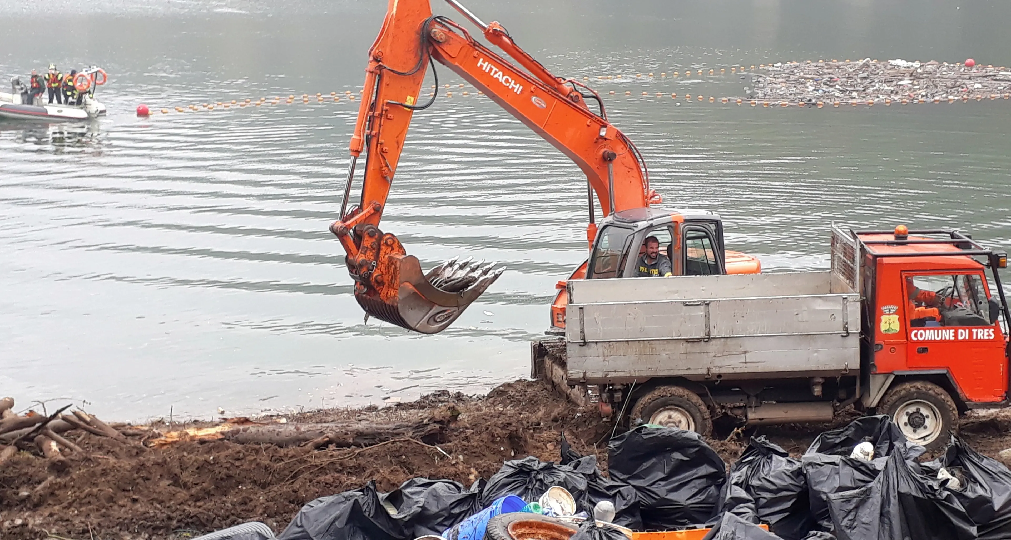 Domani giornata ecologica tutti a ripulire Santa Giustina dai rifiuti nel lago