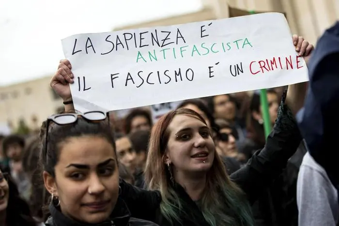 The anti-fascist demonstration awaiting the intervention of Mimmo Lucano, suspended mayor of Riace, in Aldo Moro square in Rome, Italy, 13 May 2019. With a big banner in his head \\\"Fascism is not an opinion\\\" the anti-fascist student procession started from the university city directed to piazzale Aldo Moro to protest against the rally of Forza Nuova, banned by the police, scheduled at 14.30 against the intervention of the former mayor of Riace pro migrants Mimmo Lucano invited in the afternoon to a seminar at the university. ANSA/MASSIMO PERCOSSI