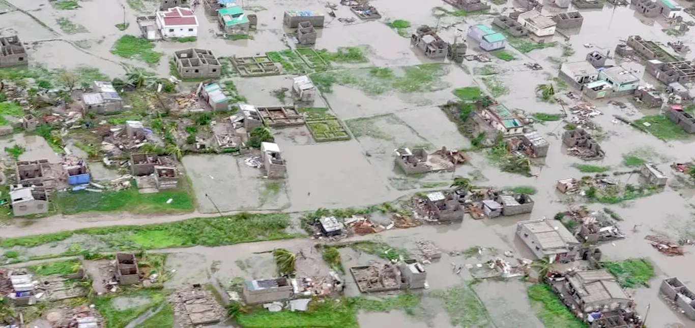 This image made available by International Federation of Red Cross and Red Crescent Societies (IFRC) on Monday March 18, 2019, shows an aerial view from a helicopter of flooding in Beira, Mozambique. The Red Cross says that as much as 90 percent of Mozambique's central port city of Beira has been damaged or destroyed by tropical Cyclone Idai. (Caroline Haga/International Federation of Red Cross and Red Crescent Societies (IFRC) via AP)