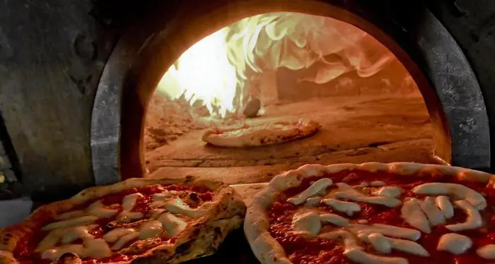La pizza è il piatto in assoluto che regala felicità
