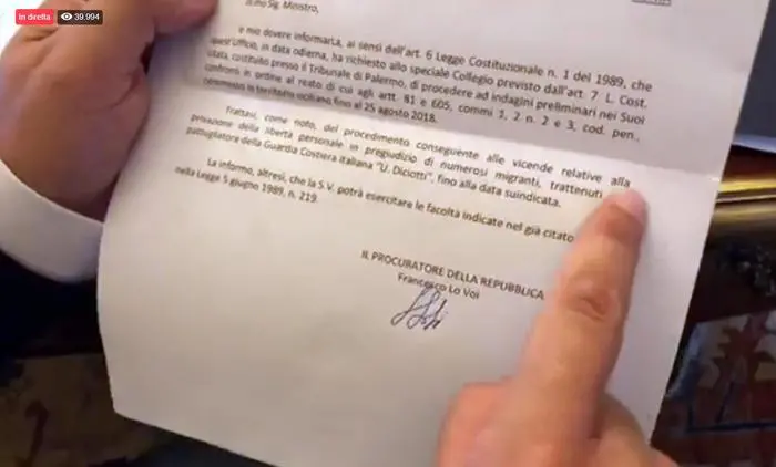 Il ministro dell'Interno Matteo Salvini apre in diretta Facebook la busta consegnatagli da carabinieri e inviata dalla Procura di Palermo, 07 settembre 2018. FERMO IMMAGINE VIDEO FACEBOOK MATTEO SALVINI +++ ATTENZIONE LA FOTO NON PUO' ESSERE PUBBLICATA O RIPRODOTTA SENZA L'AUTORIZZAZIONE DELLA FONTE DI ORIGINE CUI SI RINVIA +++ ++ HO - NO SALES - EDITORIAL USE ONLY ++