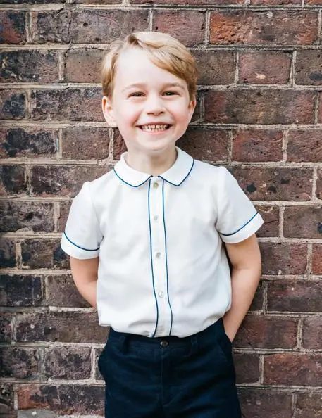 epa06903360 A handout photo made available by the Duke and Duchess of Cambridge via PA on 21 July 2018 to mark the fifth birthday of Britain's Prince George. The picture was taken in the garden at Clarence House in London, Britain on 09 July 2018, following the christening of Prince Louis. Prince George will celebrate his 5th birthday on 22 July 2018. ATTENTION EDITORS: NEWS EDITORIAL USE ONLY. NO COMMERCIAL USE. NO MERCHANDISING, ADVERTISING, SOUVENIRS, MEMORABILIA or COLOURABLY SIMILAR. NOT FOR USE AFTER 31 DECEMBER 2018 WITHOUT PRIOR PERMISSION FROM KENSINGTON PALACE. Copyright in the photograph is vested in The Duke and Duchess of Cambridge. Publications are asked to credit the photographs to Matt Porteous. No charge should be made for the supply, release or publication of the photograph. The photograph must not be digitally enhanced, manipulated or modified in any manner or form and must include all of the individuals in the photograph when published. EPA/Matt Porteous / KENSINGTON PALACE / HANDOUT HANDOUT EDITORIAL USE ONLY/NO SALES/NO ARCHIVES