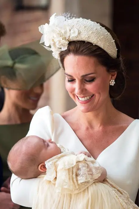 epa06876314 Britain's Catherine, the Duchess of Cambridge with her son Prince Louis attend the Christening of Prince Louis at St.James's Palace in London, Briatin, 09 July 2018. Britain's Prince Louis, born on 23 April, is the Duke and Duchess of Cambridge third child and fifth in line to the British throne. EPA/STR UK AND IRELAND OUT SHUTTERSTOCK OUT