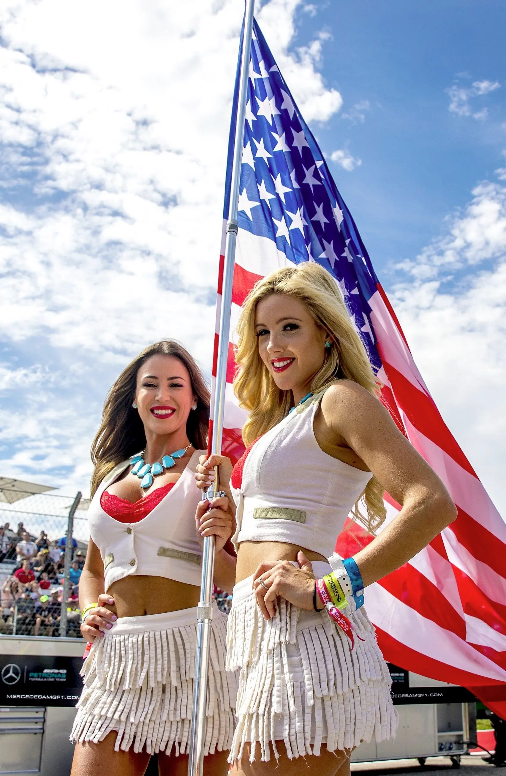 epa06488043 (FILE) Grid girls pose on the track prior to the start of the United States Formula One Grand Prix 2016 at the Circuit of the Americas, in Austin, Texas, USA, 23 October 2016 (reissued 31 January 2018). According to reports on 31 January 2018, Formula One have announced they will end the long-established practice of using walk-on grid girls, commencing with the start of the 2018 FIA Formula One World Championship season. EPA/SRDJAN SUKI