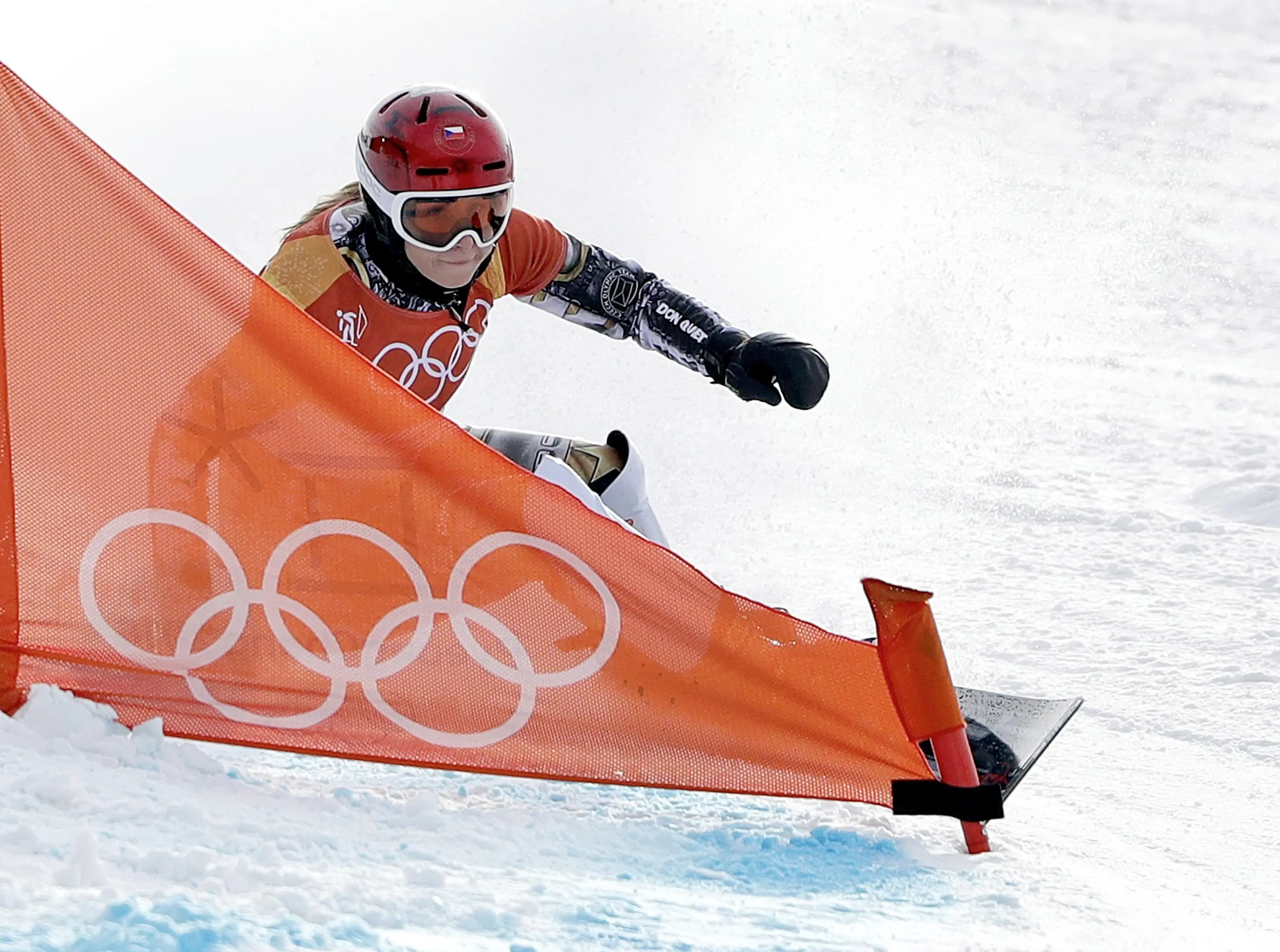 Gold medal winner Ester Ledecka, of the Czech Republic, runs the course during the women's parallel giant slalom final at Phoenix Snow Park at the 2018 Winter Olympics in Pyeongchang, South Korea, Saturday, Feb. 24, 2018. (ANSA/AP Photo/Gregory Bull) [CopyrightNotice: Copyright 2018 The Associated Press. All rights reserved]