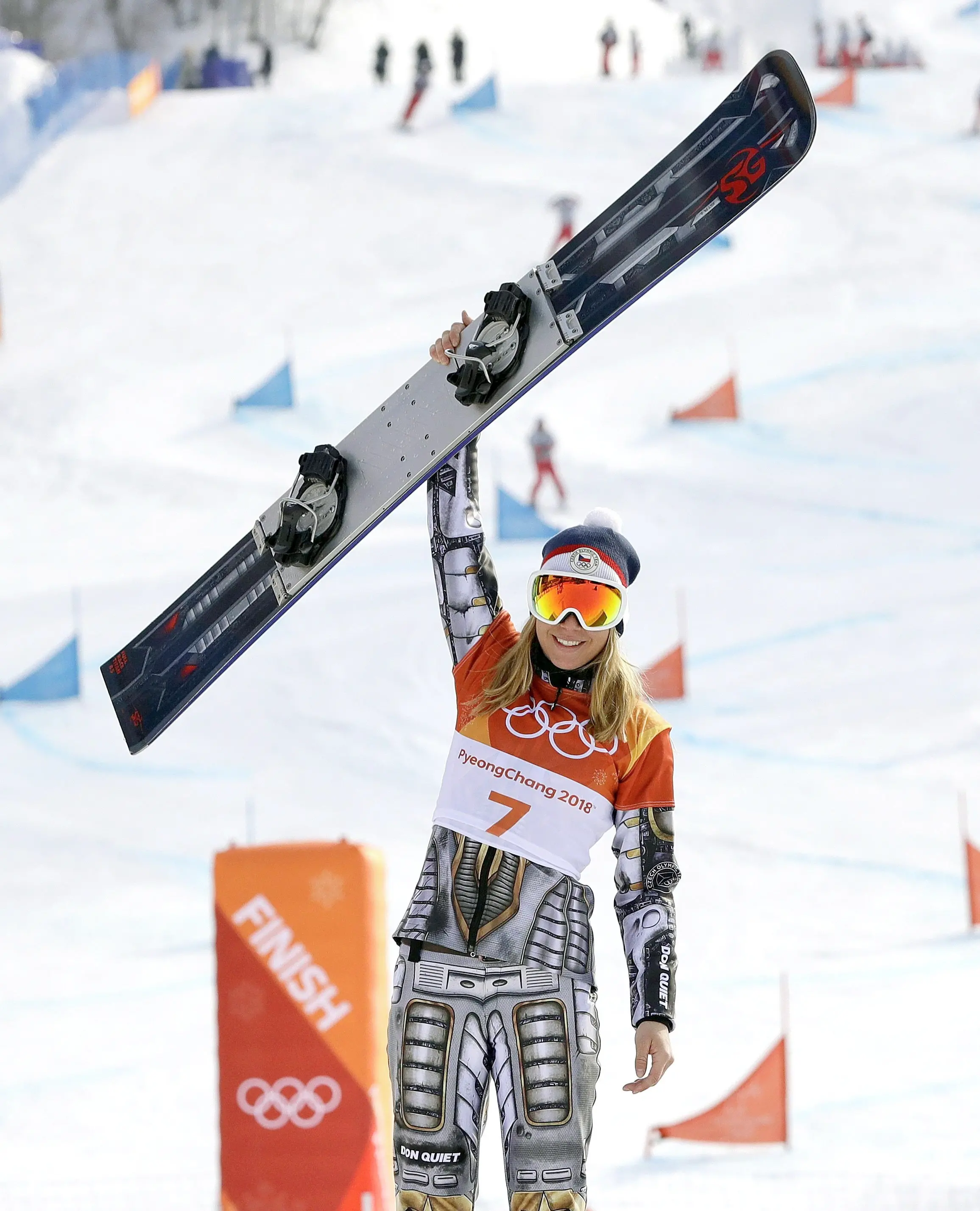 Gold medal winner Ester Ledecka, of the Czech Republic, celebrates after the women's parallel giant slalom at Phoenix Snow Park at the 2018 Winter Olympics in Pyeongchang, South Korea, Saturday, Feb. 24, 2018.(ANSA/AP Photo/Lee Jin-man) [CopyrightNotice: Copyright 2018 The Associated Press. All rights reserved]