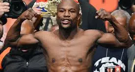Boxe, Mayweather manda ko l'eleganza sui social mostra assegno da 100 milioni