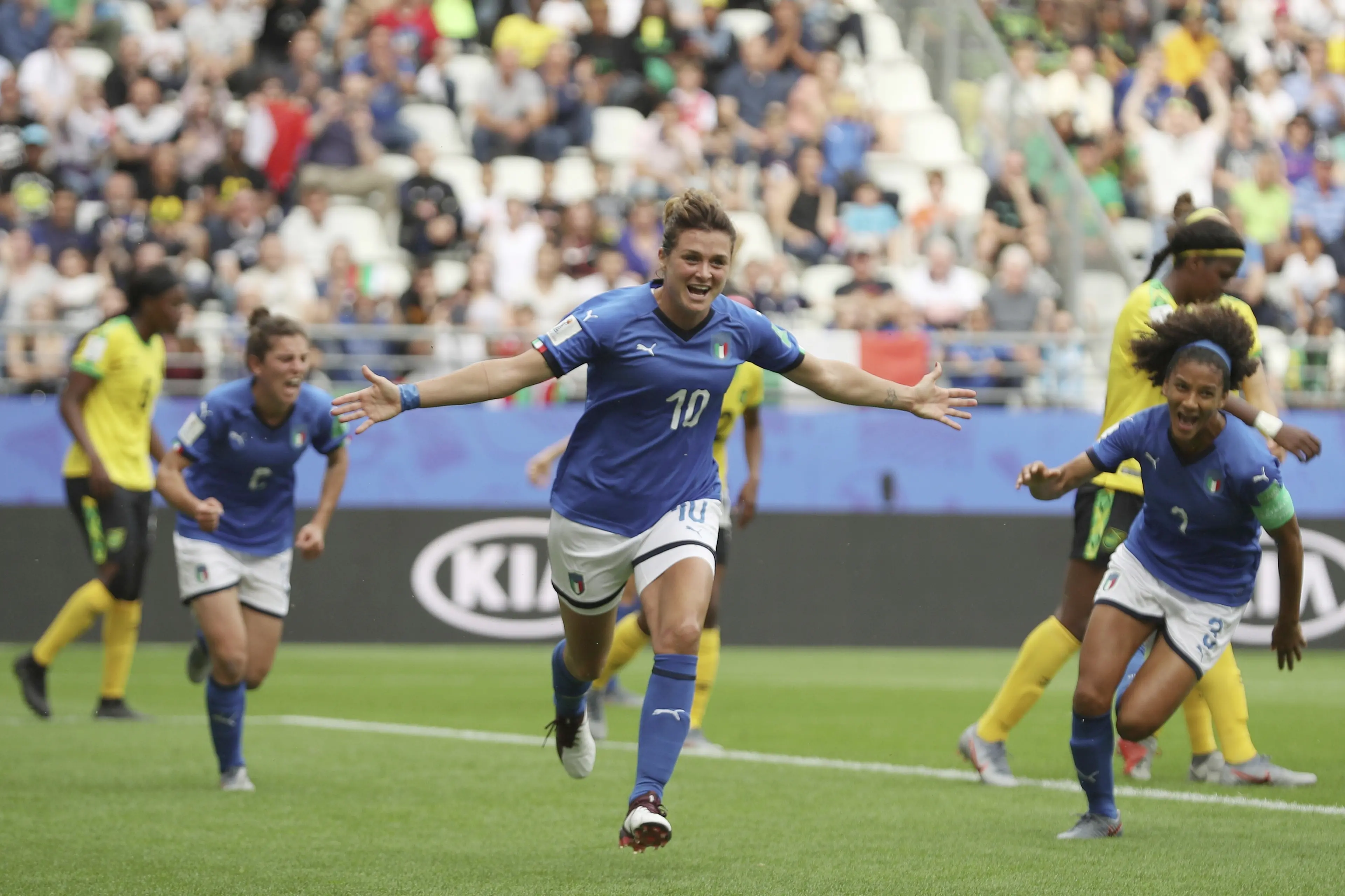 Italy's Cristiana Girelli, center, celebrates after scoring her side's second goal during the Women's World Cup Group C soccer match between Italy and Jamaica at the Stade Auguste-Delaune in Reims, France, Friday, June 14, 2019. (ANSA/AP Photo/Francisco Seco) [CopyrightNotice: Copyright 2019 The Associated Press. All rights reserved]