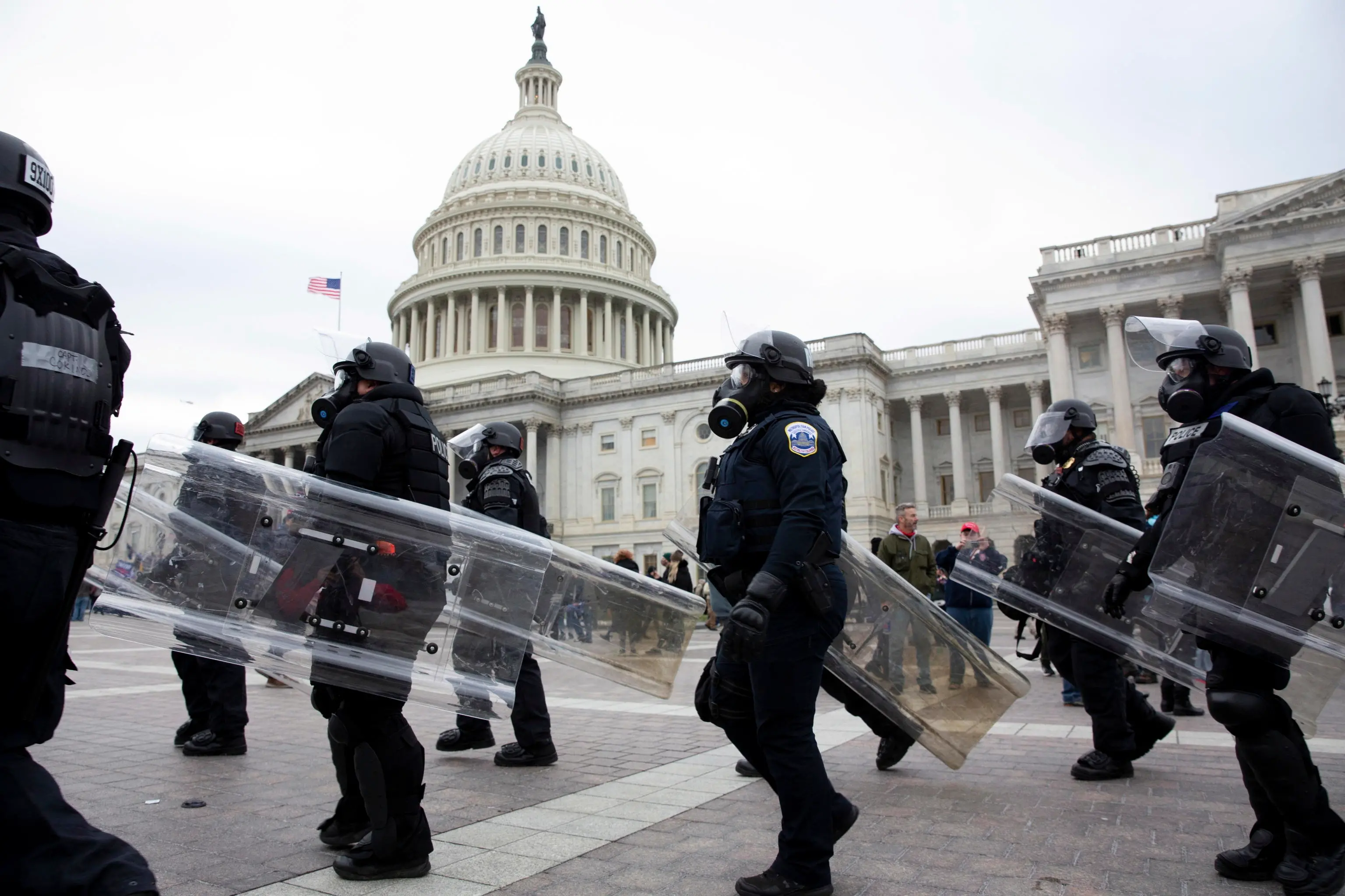 epa08923525 Police respond on the East Front of the US Capitol after Pro-Trump protesters stormed the US Capitol, in Washington, DC, USA, 06 January 2021. Right-wing conservative groups are protesting against Congress counting the electoral college votes. Dozens of state and federal judges have shot down challenges to the 2020 presidential election, finding the accusations of fraud to be without merit. EPA/MICHAEL REYNOLDS