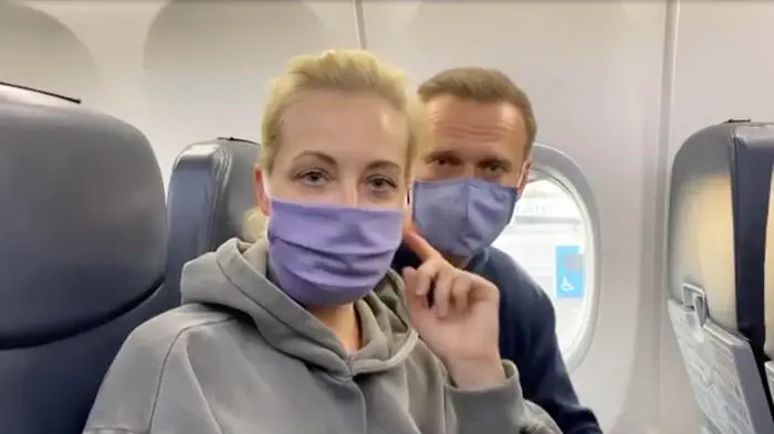 epa08943745 A frame grab of Alexei and Yulia Navalnaya taken from a video posted on the Instagram account @navalny shows Russian opposition Leader Alexei Navalny before his flight at the Berlin Brandenburg International Airport BER in Schoenefeld, Germany, 17 January 2021 Russian opposition leader Alexei Navalny plans to return to Russia on a scheduled flight to Moscow later in the afternoon on 17 January. He was treated at the Charite hospital in Berlin since 22 August 2020 for being poisoned with a nerve agent from the Novichok group and was discharged from acute inpatient care on 22 September 2020. EPA/ALEXEI NAVALNY INSTAGRAM