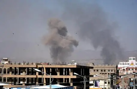 epa04916274 Smokes rise above a neighborhood following airstrikes carried out by the Saudi-led coalition targeting Houthi-held positions in Sana'a, Yemen, 06 September 2015. The Saudi-led military coalition carried out its heaviest airstrikes yet on the Yemeni capital Sana'a, in response to a missile strike two days ago that killed 60 coalition troops in the eastern province of Marib, where they have been gathering in preparation for operations against the Houthi rebels and allied military units who control the capital. EPA/YAHYA ARHAB