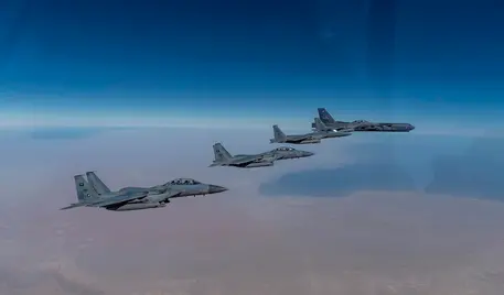 epa08968807 A handout photo made available by the US Air Force shows a US Air Force B-52 Stratofortress (R, rear) from the 2nd Bomb Wing, Barksdale Air Force Base, Louisiana, USA flying with Royal Saudi Arabian Air Force F-15SAs during a bomber task force mission over the US Central Command area of responsibility, at an undisclosed location, 27 January 2021. The Pentagon said on 26 January that it sent a B-52 bomber across the Persian Gulf region in a show 'to deter potential aggression' from Iran, media reported. The B-52 is a long-range, heavy bomber that is capable of flying at high subsonic speeds of altitudes of up to 50,000 feet. EPA/SENIOR AIRMAN ROSLYN WARD/US AIR FORCE HANDOUT HANDOUT EDITORIAL USE ONLY/NO SALES