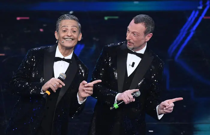 Italian showman Rosario Fiorello (L) and Sanremo Festival host and artistic director Amadeus on stage at the Ariston theatre during the 71st Sanremo Italian Song Festival, Sanremo, Italy, 02 March 2021. The festival runs from 02 to 06 March. ANSA/ETTORE FERRARI