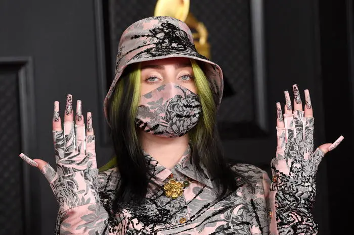 epa09075060 A handout photo made available by The Recording Academy shows Billie Eilish arriving for the 63rd Annual Grammy Awards ceremony at the Los Angeles Convention Center in Los Angeles, California, USA, 14 March 2021. EPA/KEVIN MAZUR / HANDOUT ATTENTION EDITORS: IMAGE TO BE USED ONLY IN RELATION TO THE STATED EVENT / HANDOUT EDITORIAL USE ONLY/NO SALES/NO ARCHIVES
