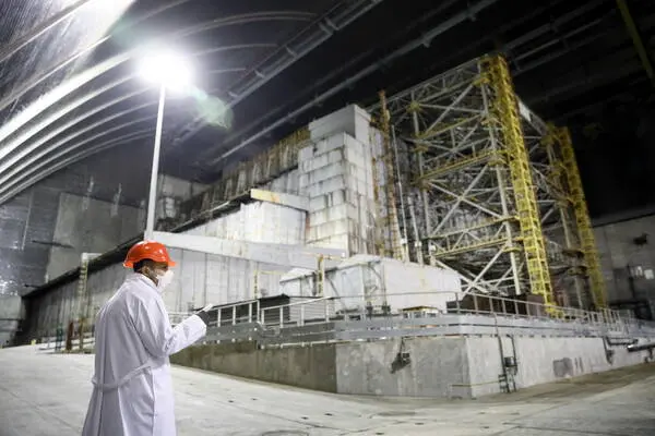 epa09137649 Chernobyl nuclear power plant workers inside the new Safe Confinement covering the 4th block of Chernobyl Nuclear power plant in Chernobyl, Ukraine, 15 April 2021. Ukraine will mark the 35th anniversary of Chernobyl tragedy on 26 April 2021. The explosion of reactor 4 of the Chernobyl nuclear power plant in the early hours of 26 April 1986 is still regarded as the worst nuclear disaster ever. EPA/OLEG PETRASYUK