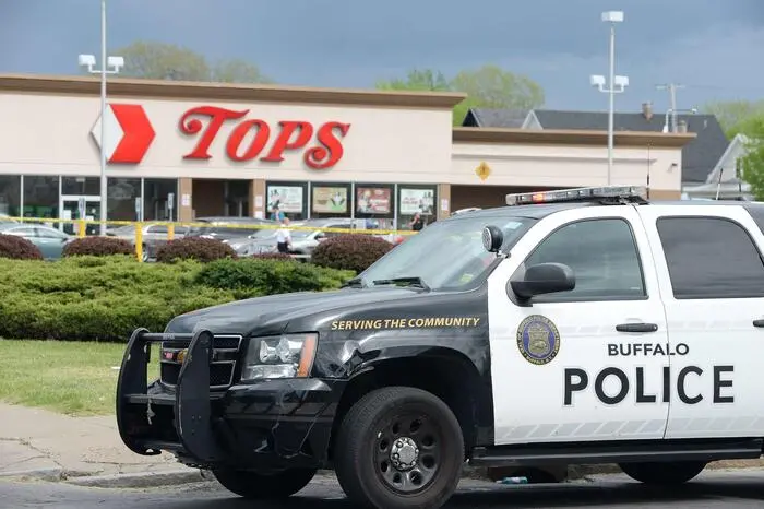 BUFFALO, NY - MAY 14: Buffalo Police on scene at a Tops Friendly Market on May 14, 2022 in Buffalo, New York. According to reports, at least 10 people were killed after a mass shooting at the store with the shooter in police custody. John Normile/Getty Images/AFP == FOR NEWSPAPERS, INTERNET, TELCOS & TELEVISION USE ONLY ==