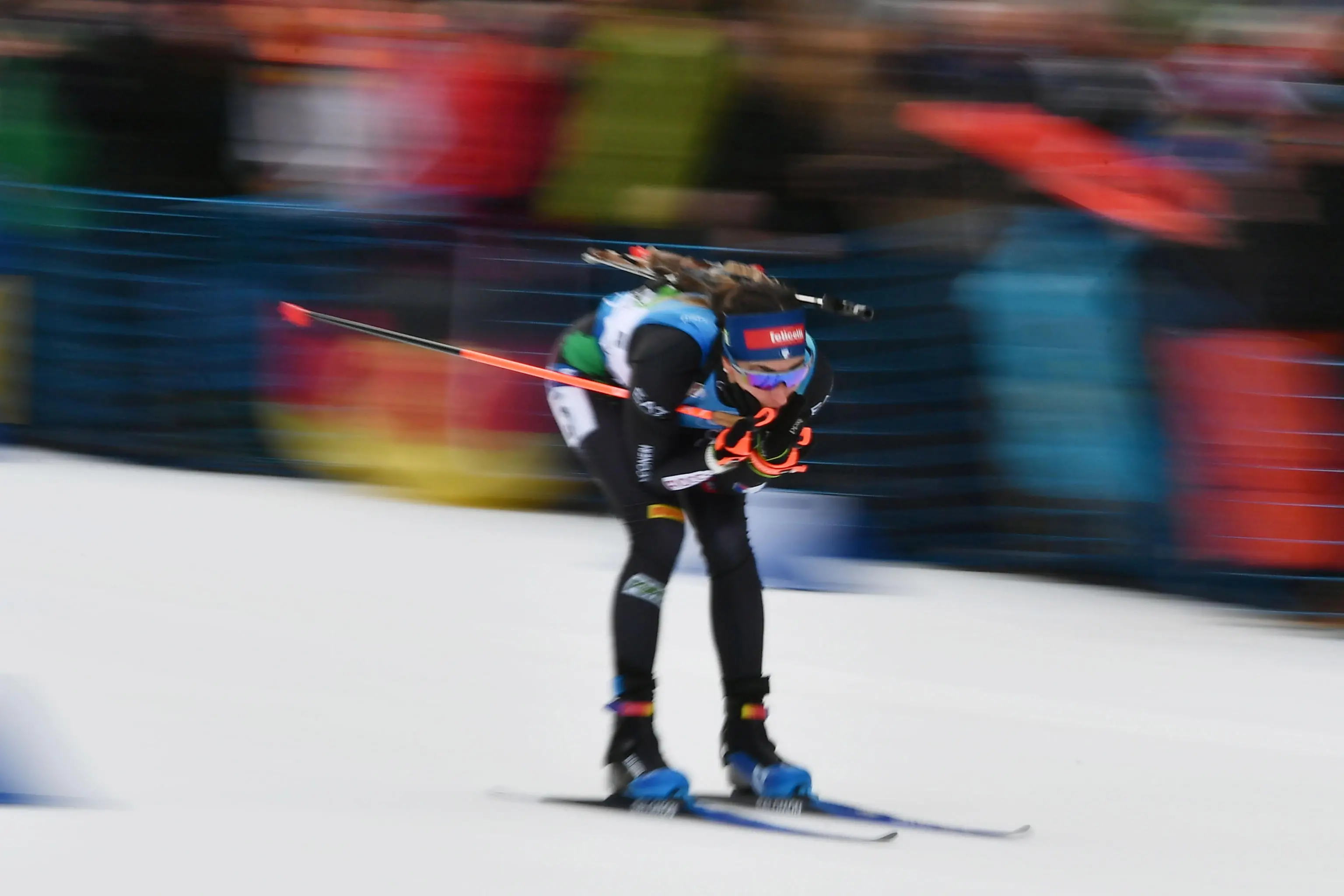 epa10405207 A slow shutter speed picture of Lisa Vittozzi of Italy competing in the Womenâ€™s 4x6 km relay competition at the IBU Biathlon World Cup in Ruhpolding, Germany, 14 January 2023. EPA/ANNA SZILAGYI
