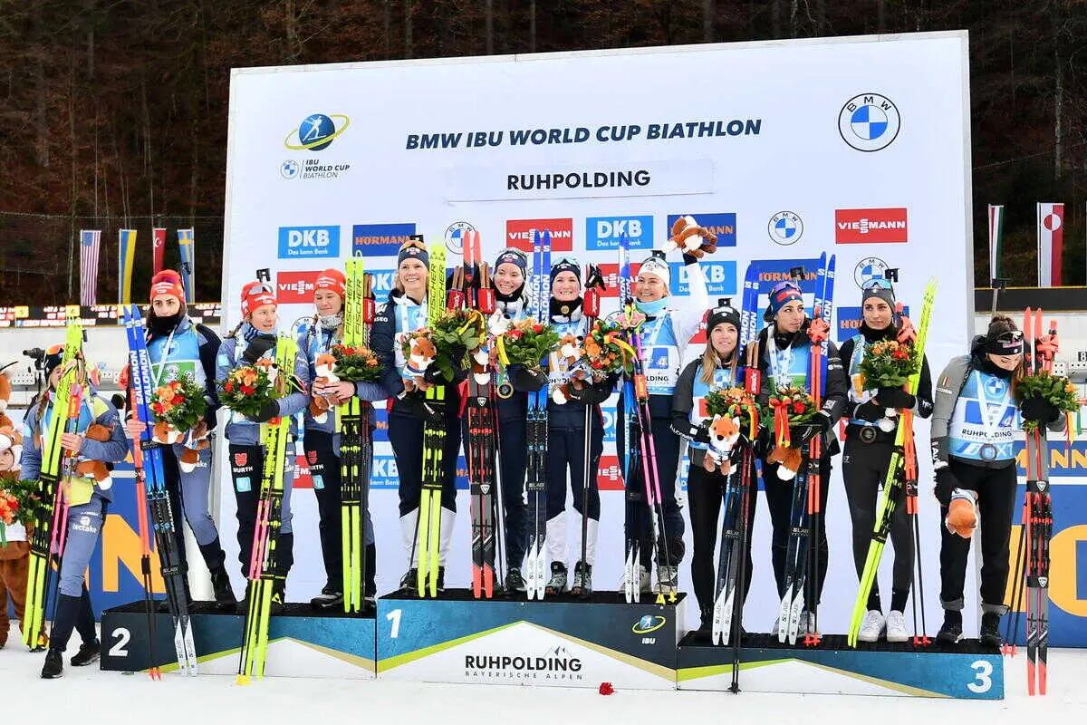epa10405138 (L-R) Team Germany, Nowray, and Italy on the podium after the Womenâ€™s 4x6 km relay competition at the IBU Biathlon World Cup in Ruhpolding, Germany, 14 January 2023. EPA/ANNA SZILAGYI