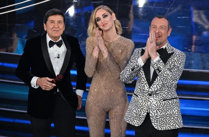 Sanremo Festival host and artistic director Amadeus (R) with Italian fashion blogger, businesswoman and model, Chiara Ferragni (C), and Sanremo Festival co-host Gianni Morandi (L) during the 73rd Sanremo Italian Song Festival, in Sanremo, Italy, 07 February 2023. The music festival will run from 07 to 11 February 2023. ANSA/ETTORE FERRARI