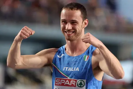 epa10502828 Samuele Ceccarelli of Italy celebrates after winning the first race in the Men's 60m semi final at the European Athletics Indoor Championships in Istanbul, Turkey, 04 March 2023. EPA/Erdem Sahin
