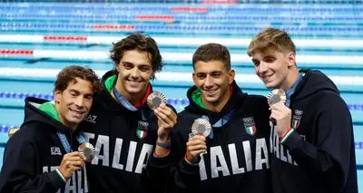 Prima giornata con tre medaglie: dopo l'argento di Ganna i bronzi nel nuoto e nella scherma
