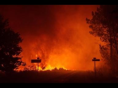 Evacuazioni di massa in aree rurali europee, vigili del fuoco in operazione durante incendi diffusi, immagine di approfondimento