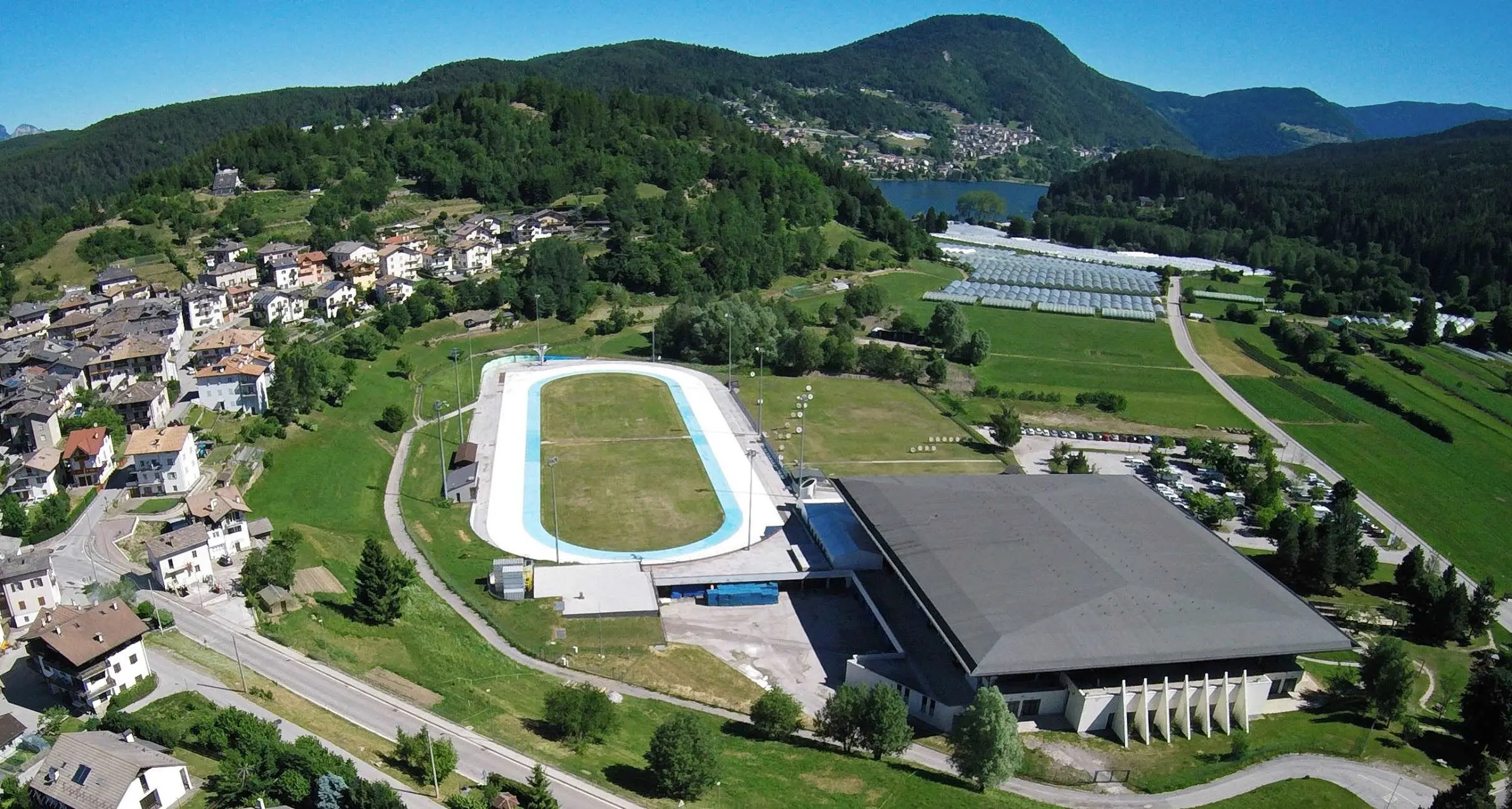 Olimpiadi, una pioggia di milioni per Ice Rink di Piné, stadio del fondo a al Lago di Tesero e trampolini del salto a Predazzo