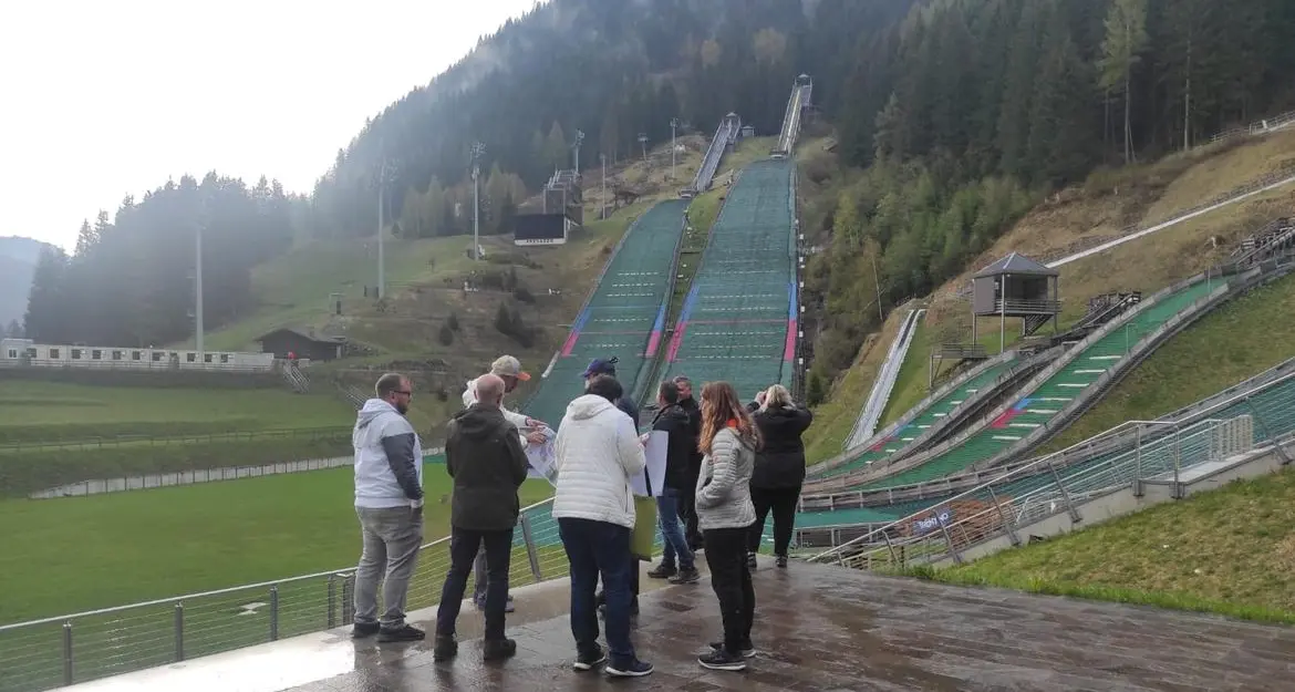 Il Comitato olimpico internazionale in sopralluogo ai trampolini di Predazzo, bando durante l’estate