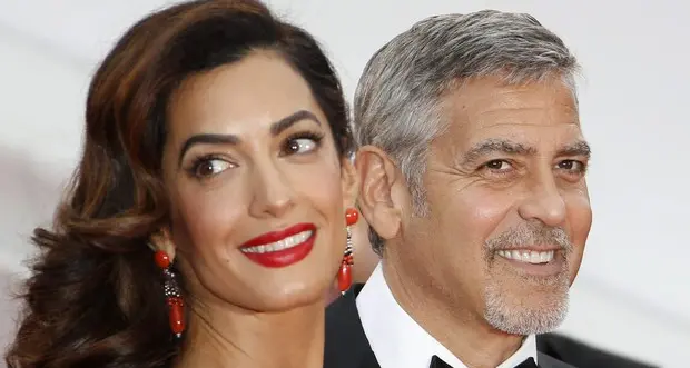 George Clooney e la moglie Amal Alamuddin in vacanza sul lago di Garda